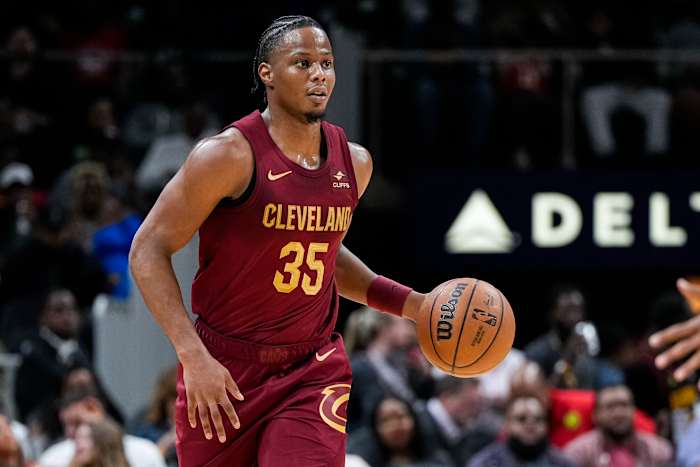Oct 10, 2023; Atlanta, Georgia, USA; Cleveland Cavaliers forward Isaac Okoro (35) brings the ball up the court against the Atlanta Hawks during the second half at State Farm Arena.